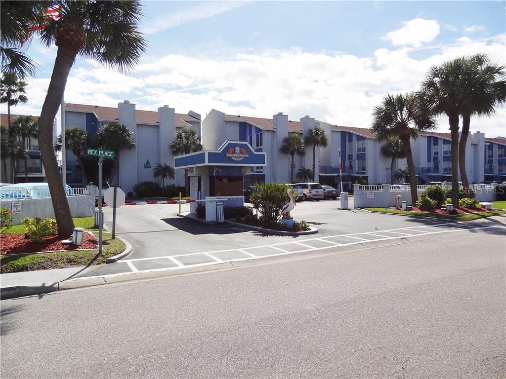 253 Rex Place, Unit G Madeira Beach, FL 33708 - Photo 1 of 1 Gated Entrance
