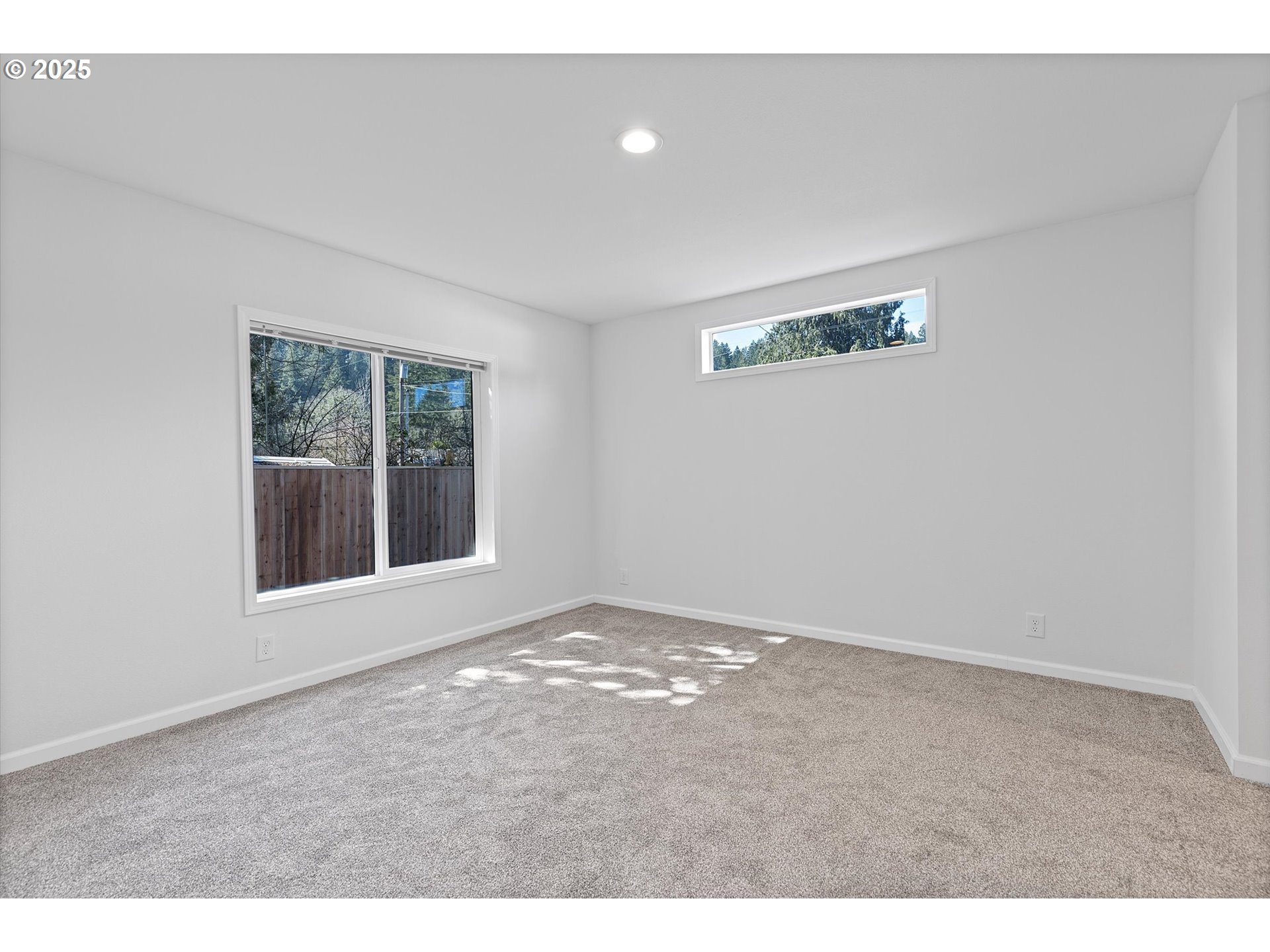 450 Southwest Juniper Road Estacada, OR 97023 - Photo 12 of 36 a view of an empty room with a window