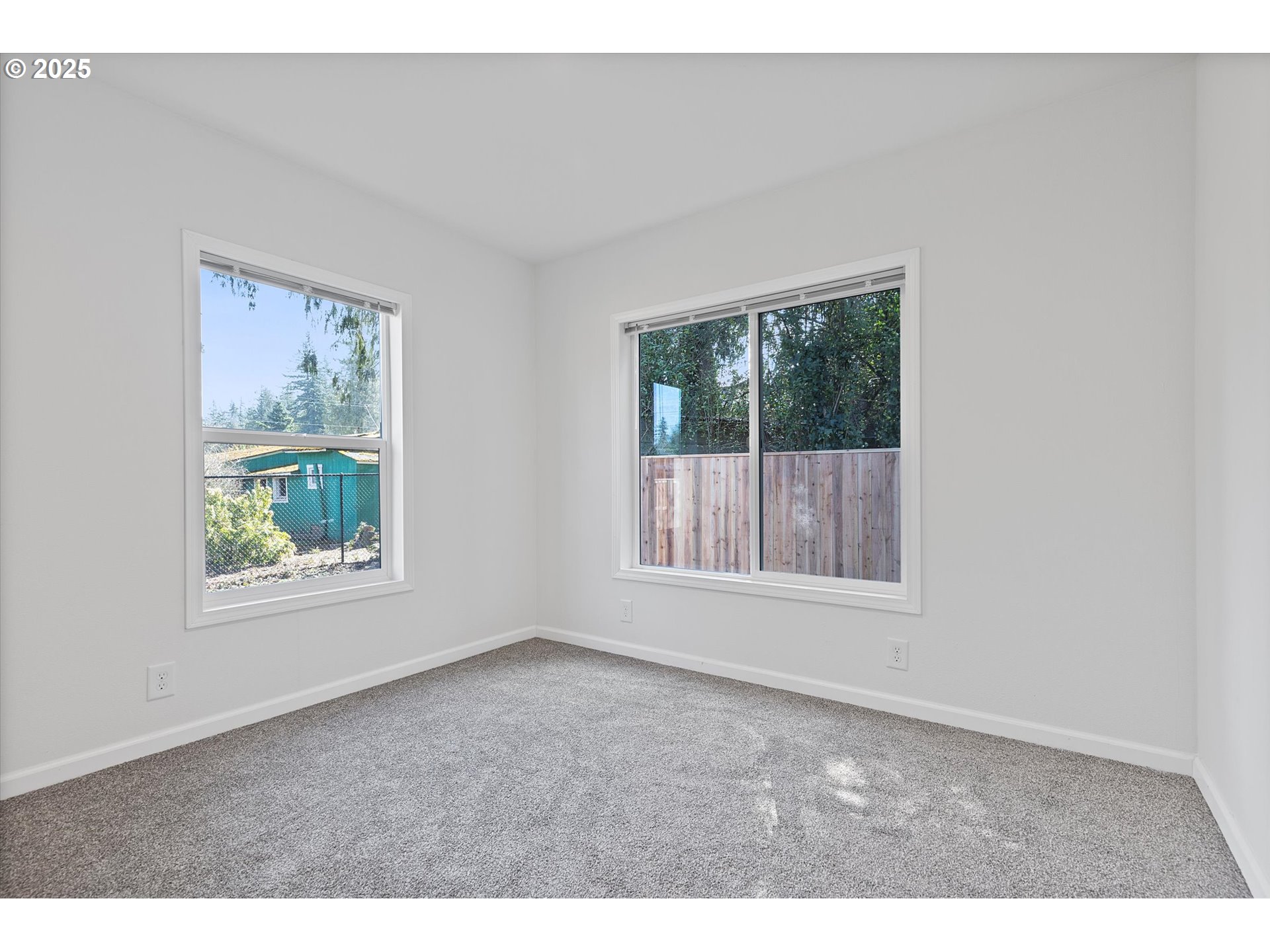 450 Southwest Juniper Road Estacada, OR 97023 - Photo 17 of 36 an empty room with windows