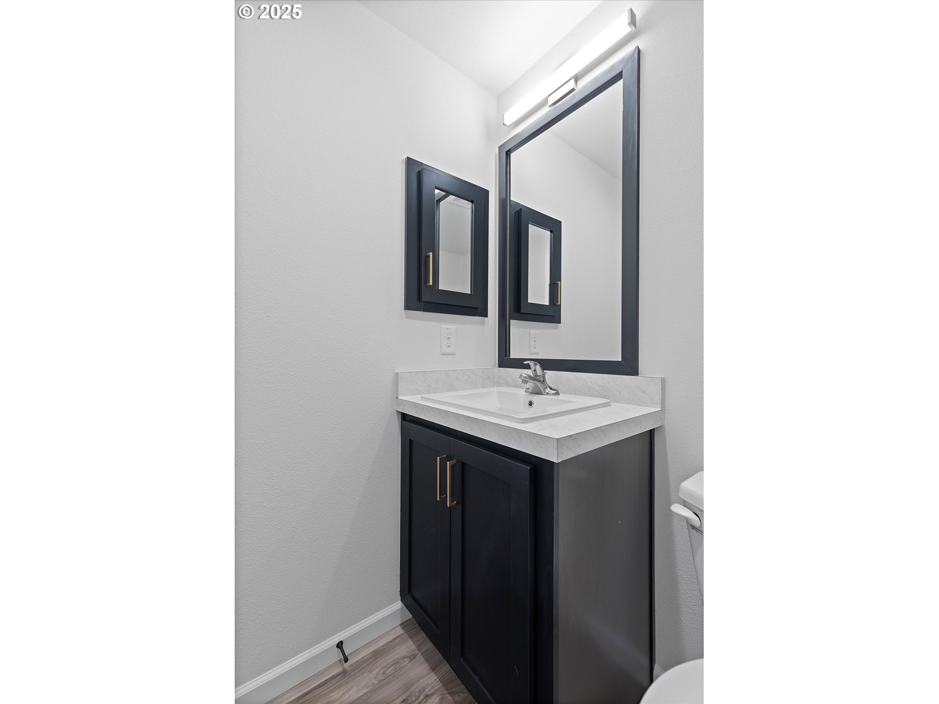 450 Southwest Juniper Road Estacada, OR 97023 - Photo 21 of 36 a bathroom with a sink and a mirror