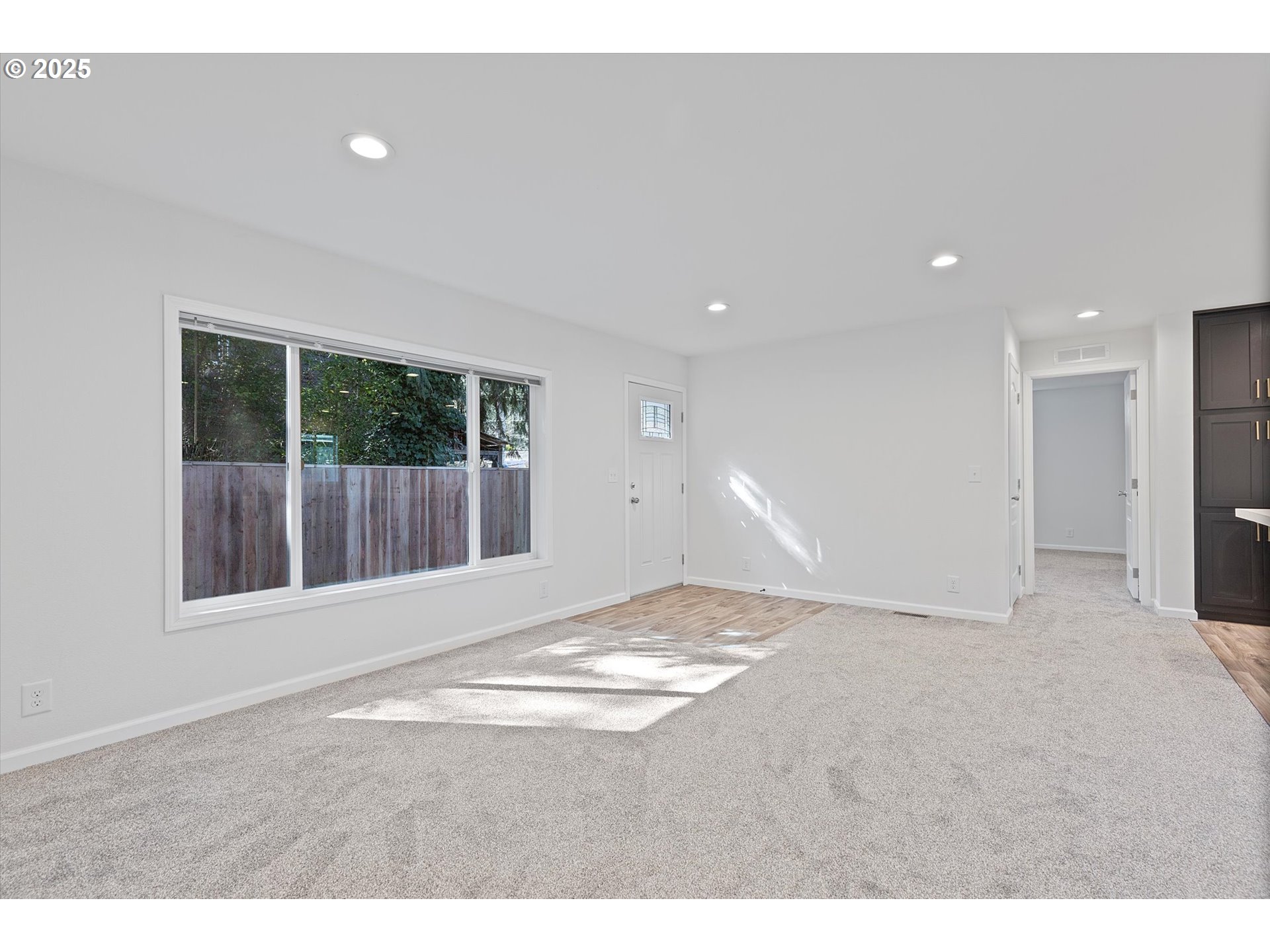 450 Southwest Juniper Road Estacada, OR 97023 - Photo 4 of 36 a view of an empty room with a window