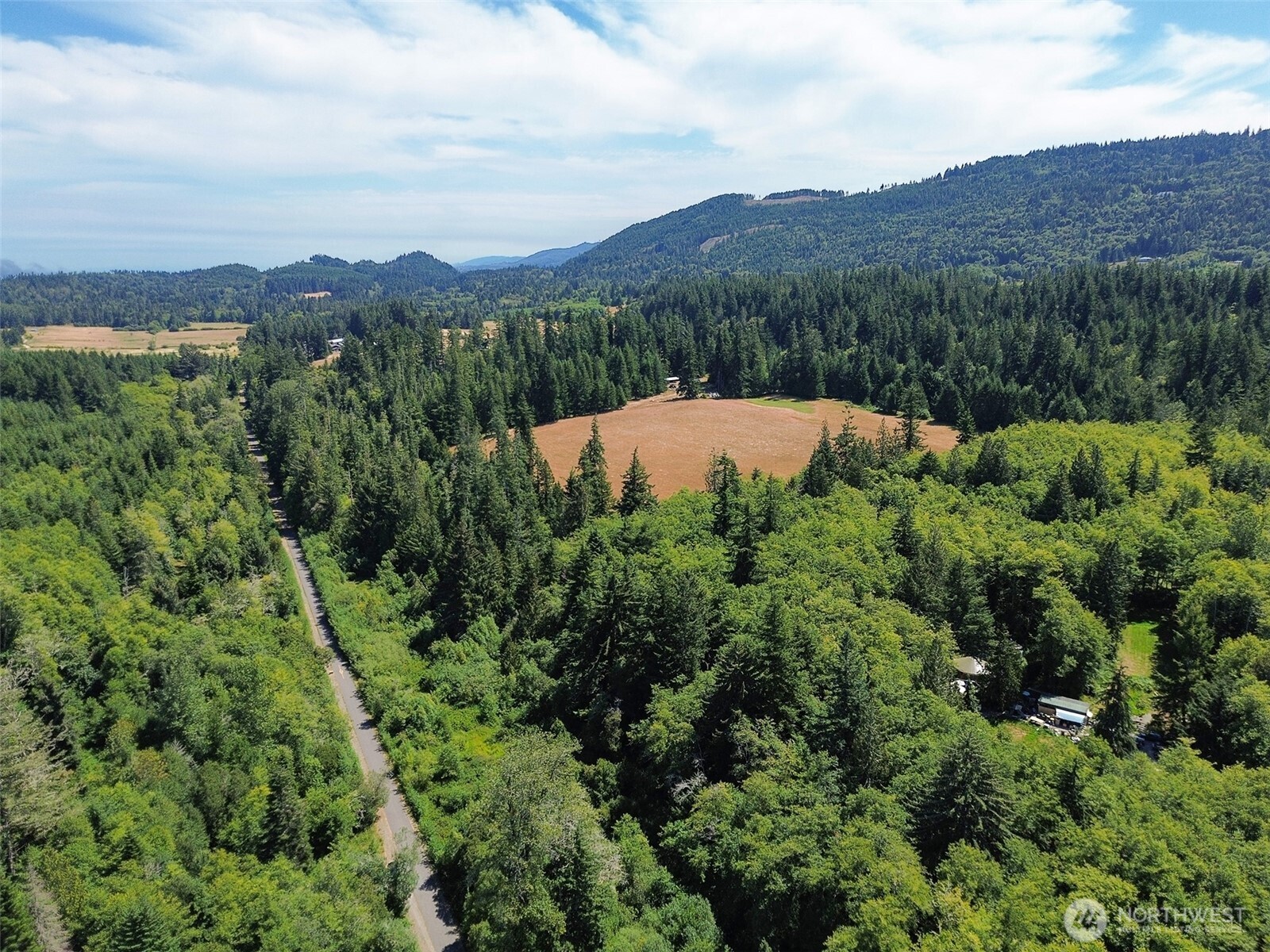 0 Thompson Road Port Angeles, WA 98363 - Photo 5 of 15 an aerial view of a house with mountain view
