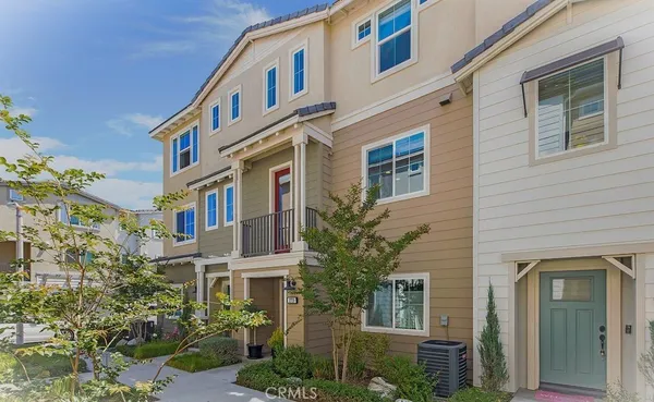 a front view of a multi story residential apartment building