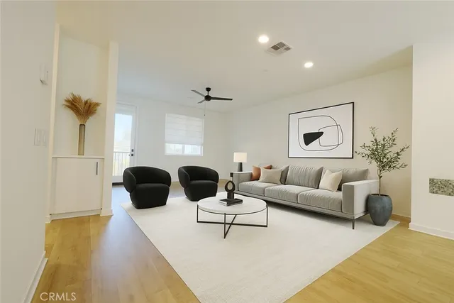 a view of an empty room and a window