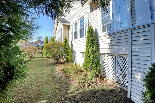 a view of a house with a tree
