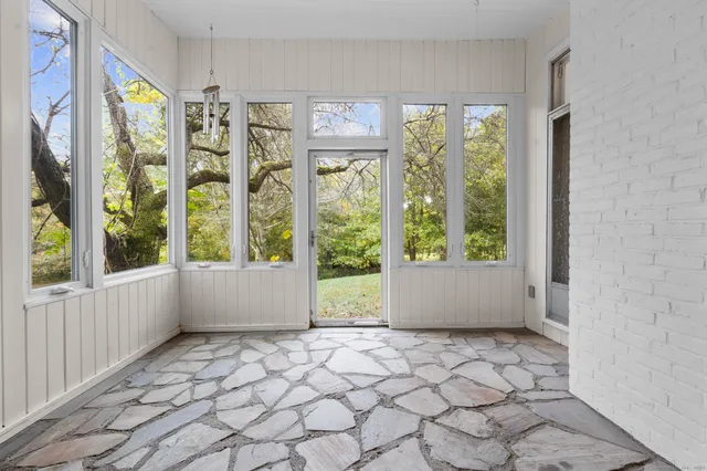 a view of front door with outdoor space