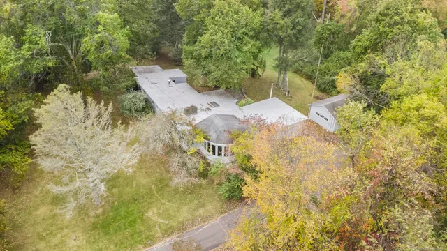 a close up of a fountain in middle of the green field