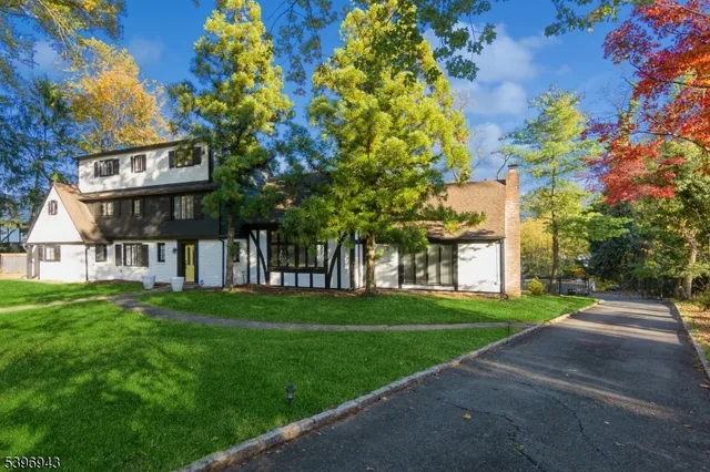 a view of a building with a yard