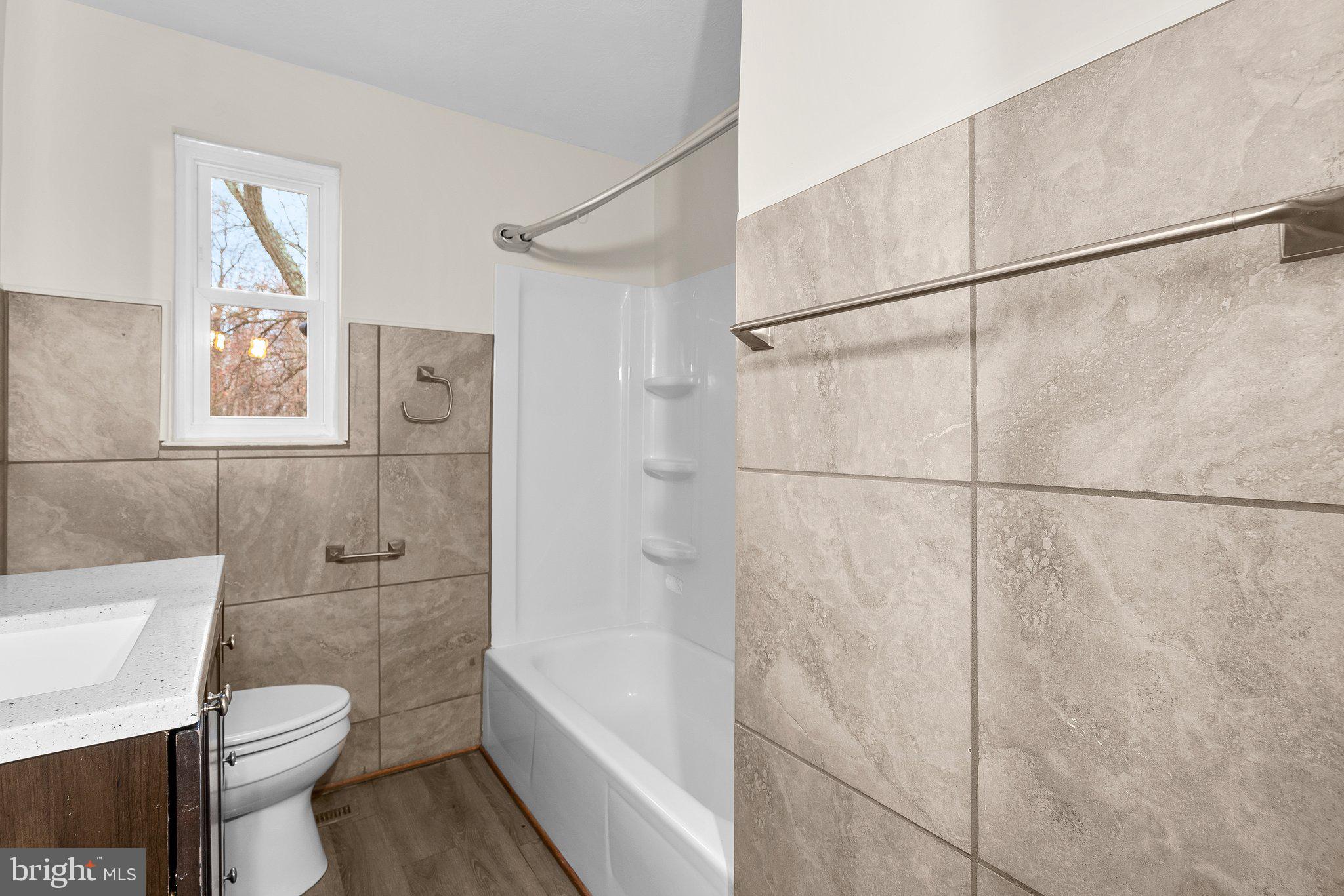 6711 Surratts Road Clinton, MD 20735 - Photo 11 of 30 Updated bathroom