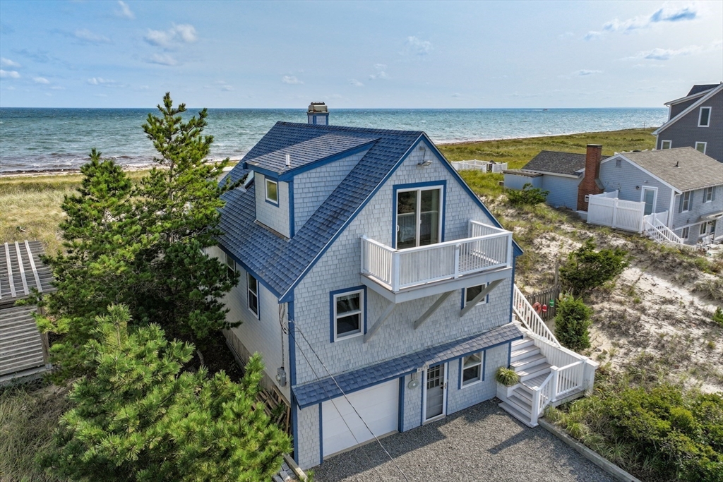 275 Phillips Road Sandwich, MA 02563 - Photo 12 of 40 a aerial view of a house with a yard
