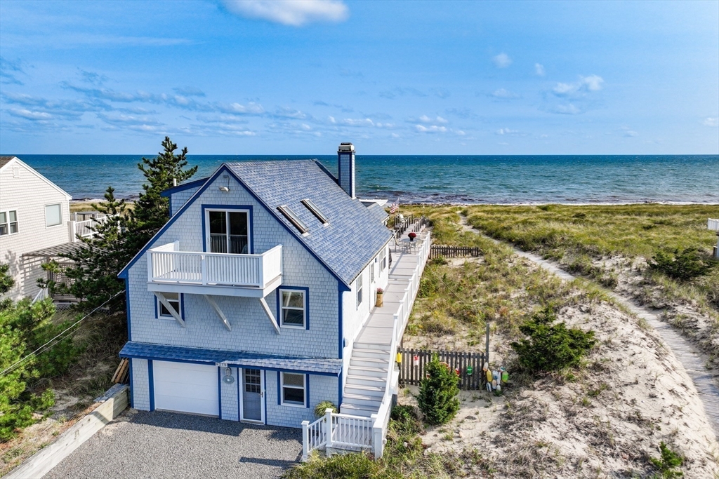 275 Phillips Road Sandwich, MA 02563 - Photo 2 of 40 a aerial view of a house with a yard