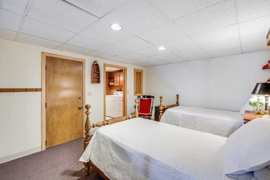 275 Phillips Road Sandwich, MA 02563 - Photo 24 of 40 a bed room with a bed and a closet