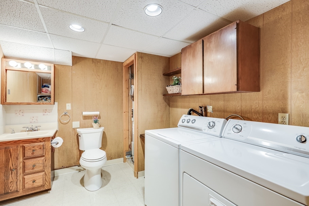 275 Phillips Road Sandwich, MA 02563 - Photo 31 of 40 a view of bathroom with a toilet sink and mirror