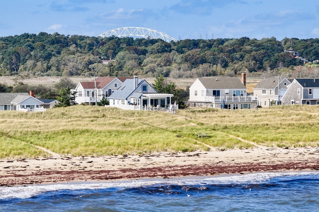 275 Phillips Road Sandwich, MA 02563 - Photo 9 of 40 a view of a house with a ocean view