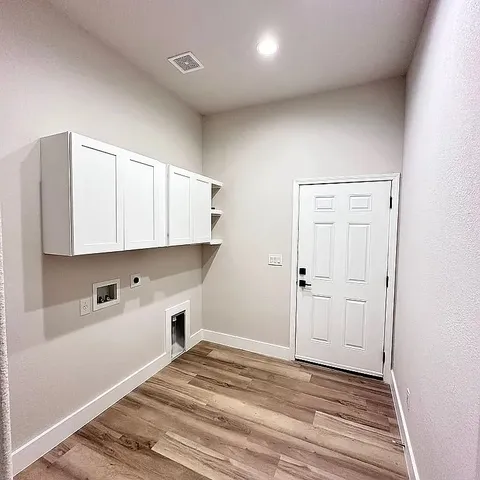 a storage room with wooden floor