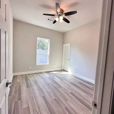 a view of an empty walk in closet