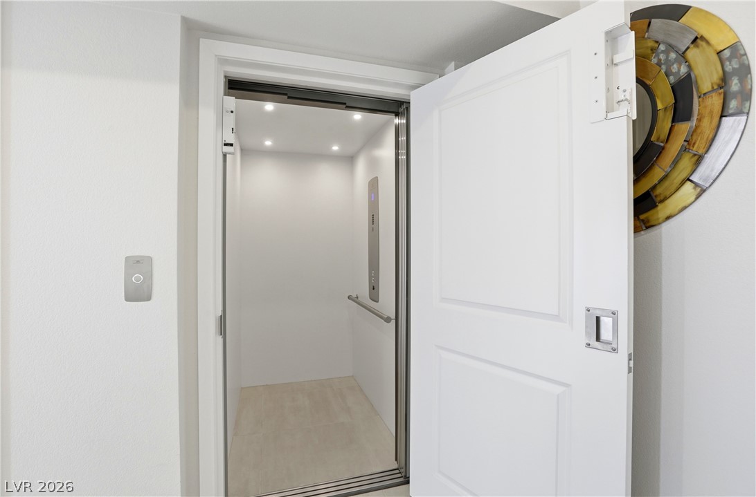 4159 Solace Street, Unit 2 Las Vegas, NV 89135 - Photo 7 of 71 Elevator from entry to top floor living.
