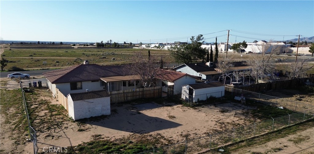 11911 Kiowa Road Apple Valley, CA 92308 - Photo 12 of 40 a view of a terrace with a bench