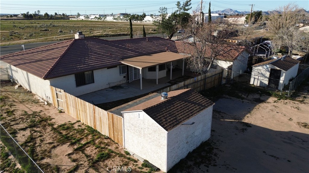 11911 Kiowa Road Apple Valley, CA 92308 - Photo 14 of 40 a view of terrace with wooden floor and seating space