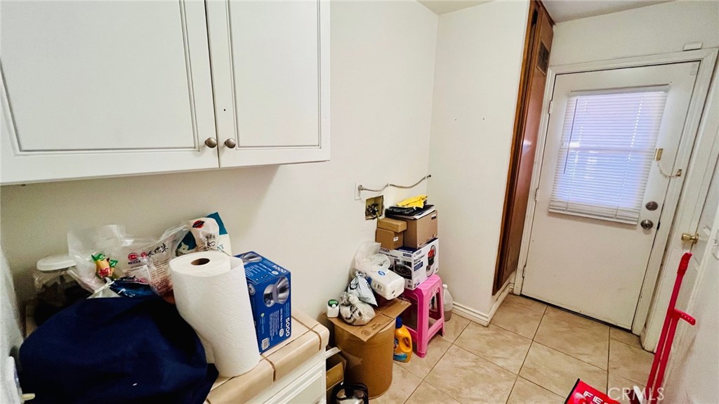 11911 Kiowa Road Apple Valley, CA 92308 - Photo 38 of 40 a room with storage and utility