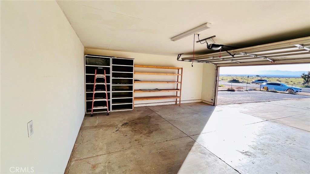 11911 Kiowa Road Apple Valley, CA 92308 - Photo 39 of 40 a view of an empty room and storage
