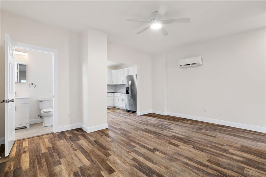 311 Elsdon Street Pittsburgh, PA 15214 - Photo 4 of 35 a view of empty room with wooden floor