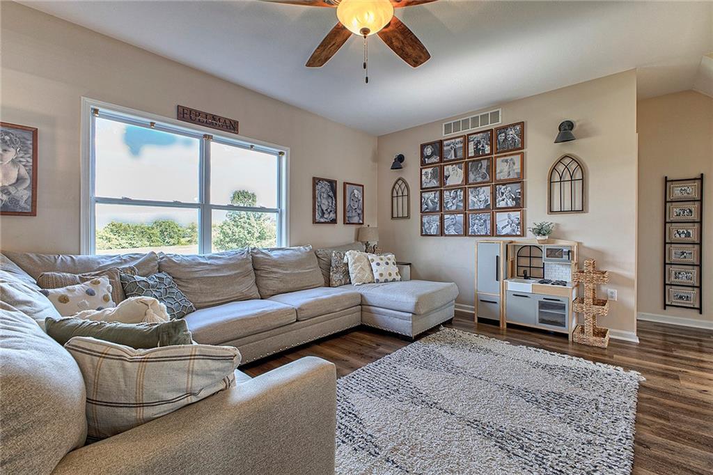 142 Lentz Road Latrobe, PA 15650 - Photo 11 of 32 a living room with furniture or couch and a large window