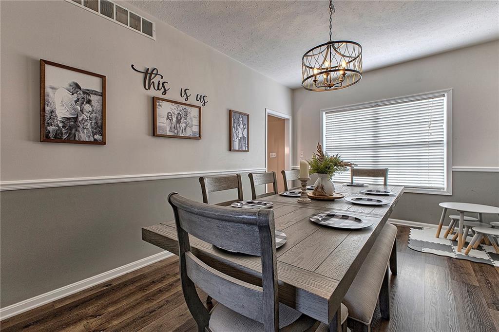 142 Lentz Road Latrobe, PA 15650 - Photo 14 of 32 a view of a dining room with furniture window and wooden floor