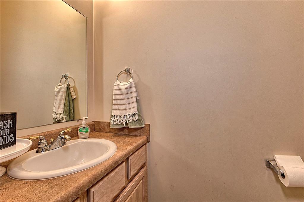 142 Lentz Road Latrobe, PA 15650 - Photo 15 of 32 a bathroom with a sink and a mirror