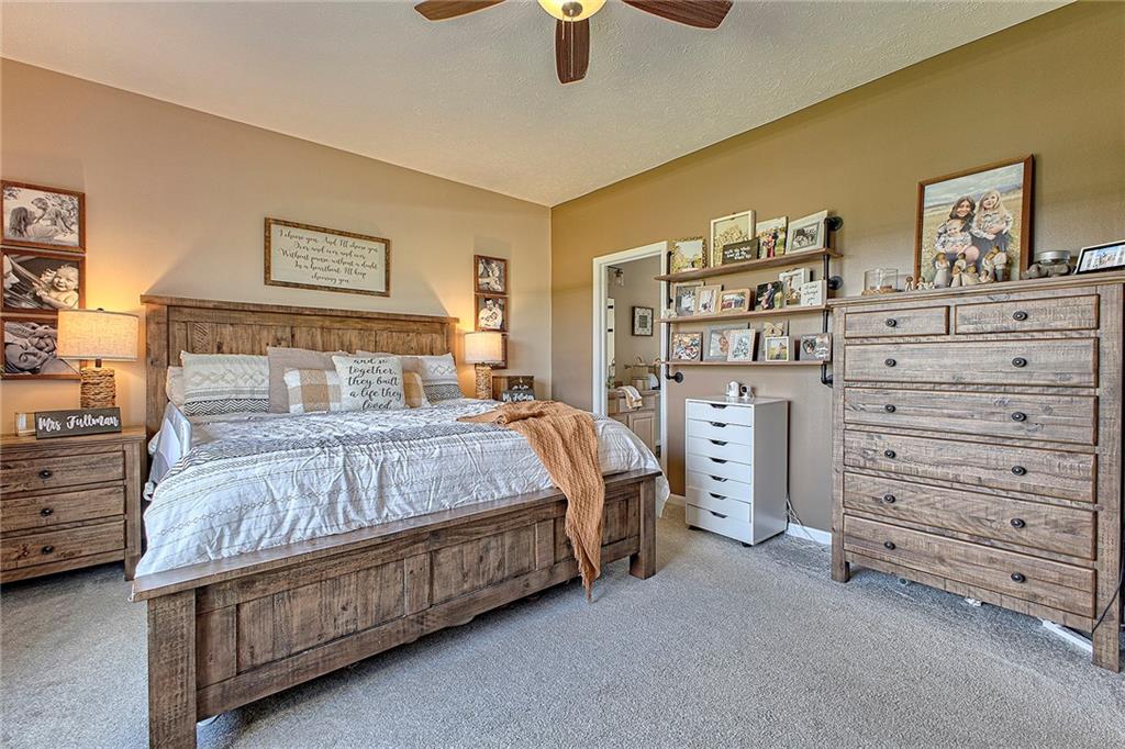 142 Lentz Road Latrobe, PA 15650 - Photo 18 of 32 a bedroom with a bed and cabinets