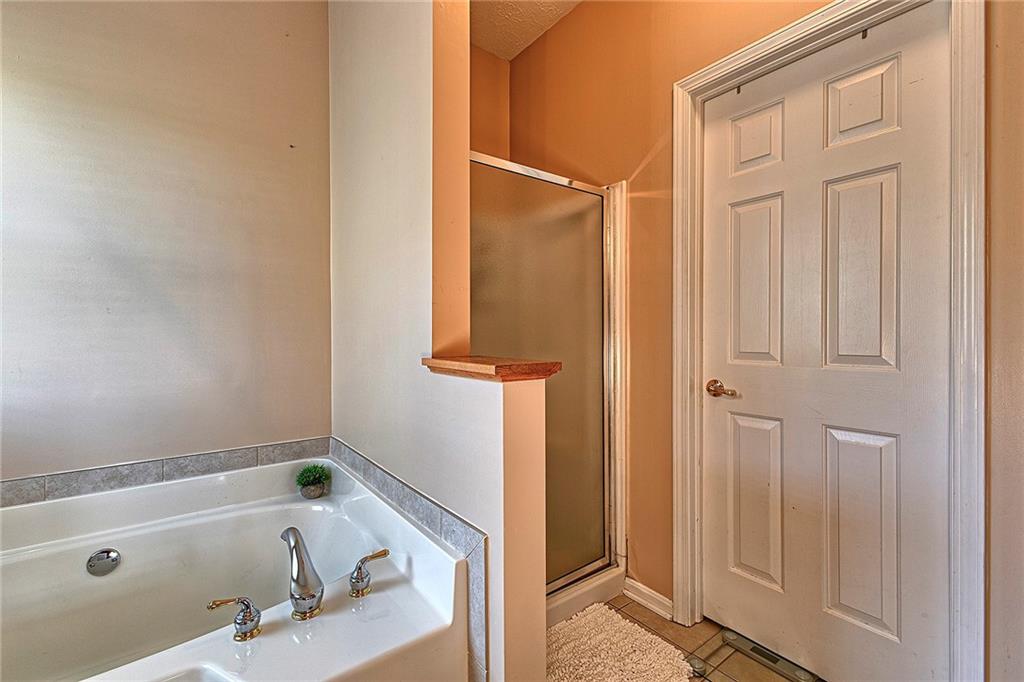 142 Lentz Road Latrobe, PA 15650 - Photo 21 of 32 a bathroom with a tub and shower