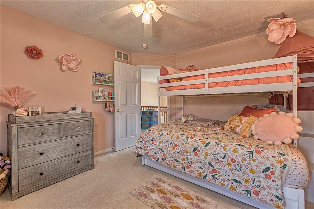 142 Lentz Road Latrobe, PA 15650 - Photo 23 of 32 a bedroom with a bed and a window