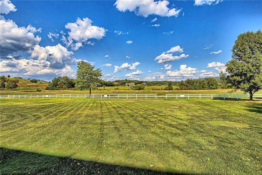 142 Lentz Road Latrobe, PA 15650 - Photo 30 of 32 a view of a swimming pool with an outdoor space and seating area