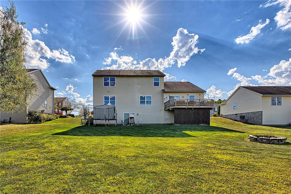 142 Lentz Road Latrobe, PA 15650 - Photo 31 of 32 a view of a house with swimming pool yard and fire pit