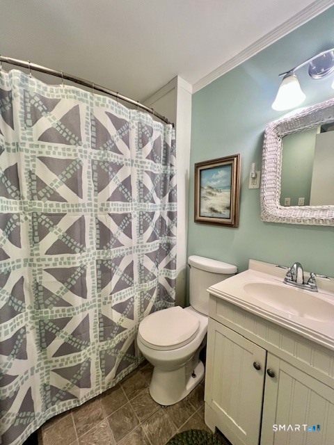 19 Old Forge Road Westbrook, CT 06498 - Photo 12 of 16 a bathroom with a sink a toilet and a mirror