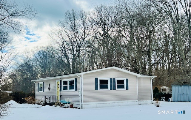 19 Old Forge Road Westbrook, CT 06498 - Photo 16 of 16 a front view of a house with a yard