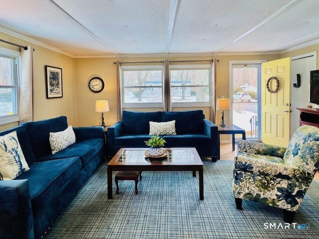 19 Old Forge Road Westbrook, CT 06498 - Photo 6 of 16 a living room with furniture and wooden floor