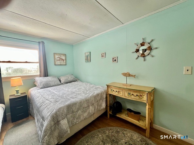 19 Old Forge Road Westbrook, CT 06498 - Photo 9 of 16 a bedroom with a bed and a window