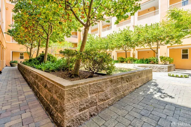 a view of a pathway and a pathway of a house