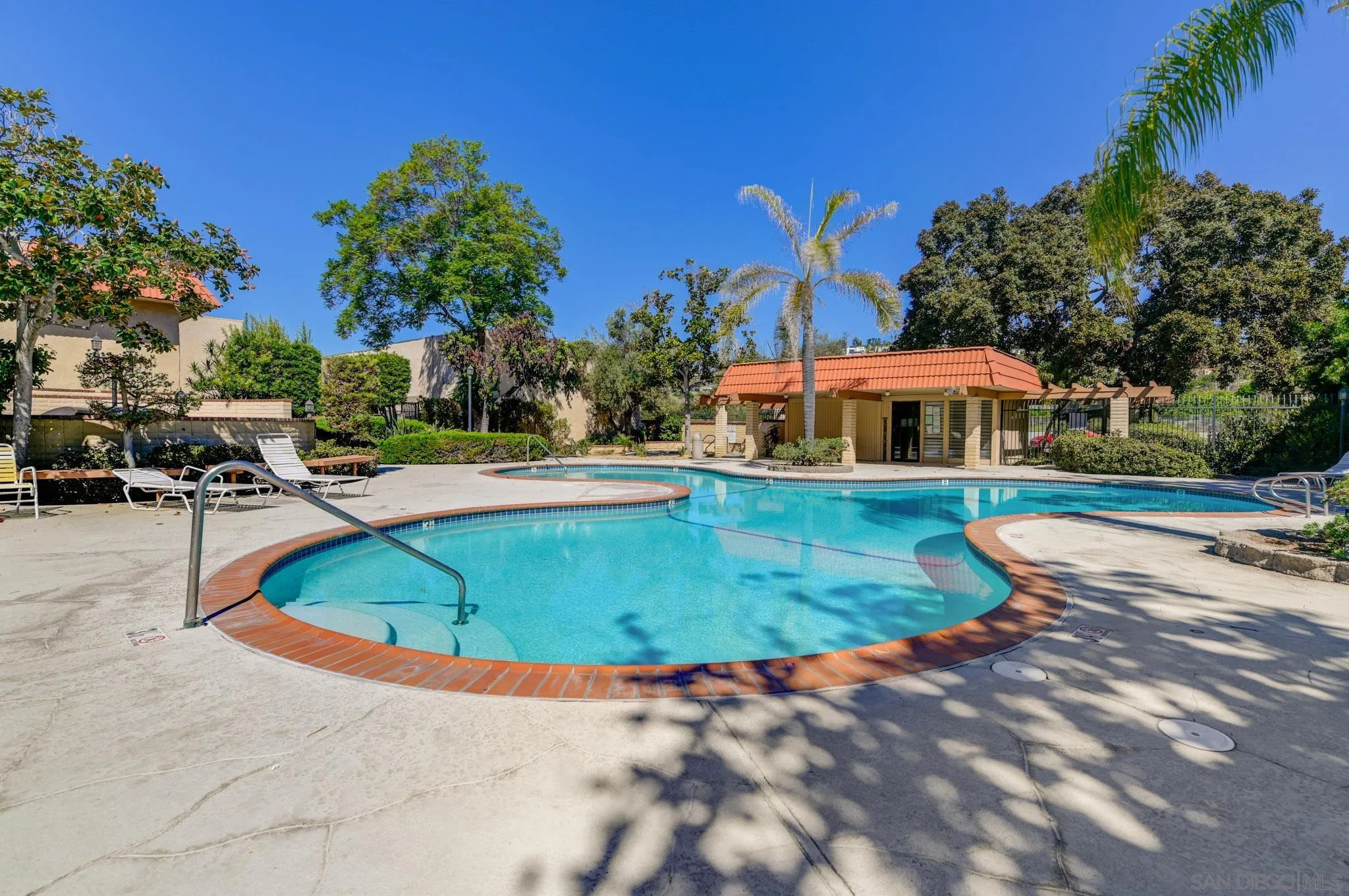 6775 Alvarado Road, Unit 21 San Diego, CA 92120 - Photo 24 of 27 a view of a swimming pool with outdoor seating