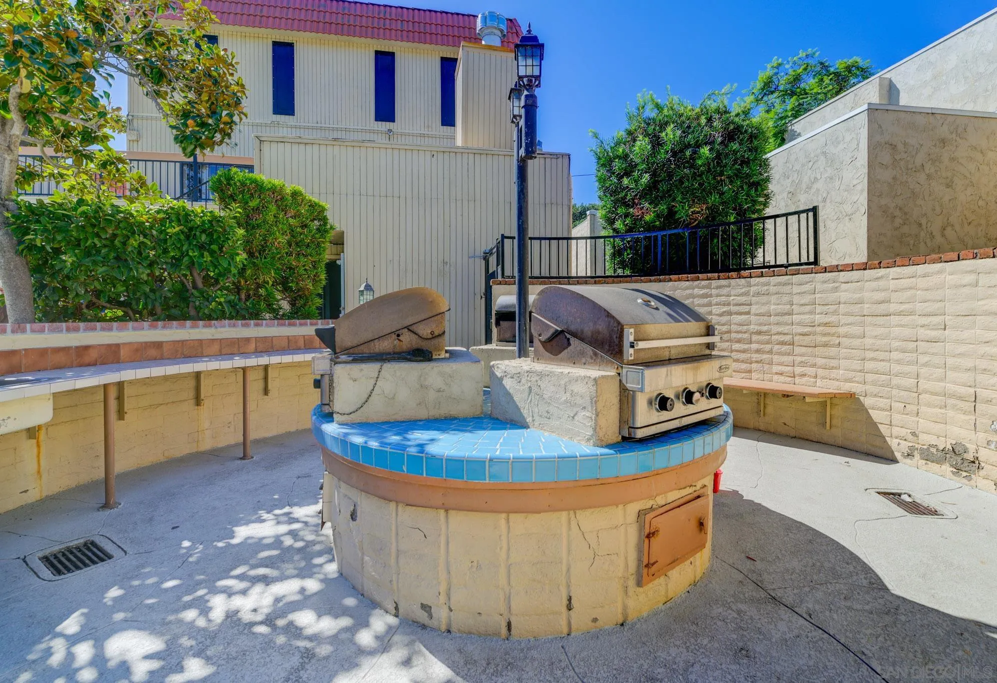 6775 Alvarado Road, Unit 21 San Diego, CA 92120 - Photo 25 of 27 a view of a two chairs in the patio