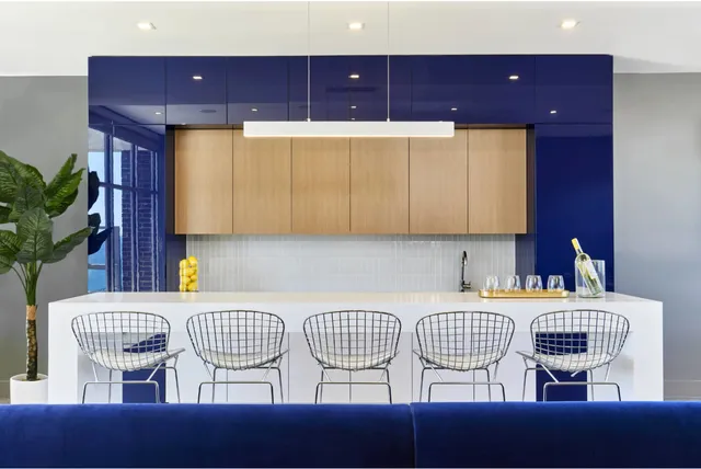 a kitchen with a sink cabinets and window