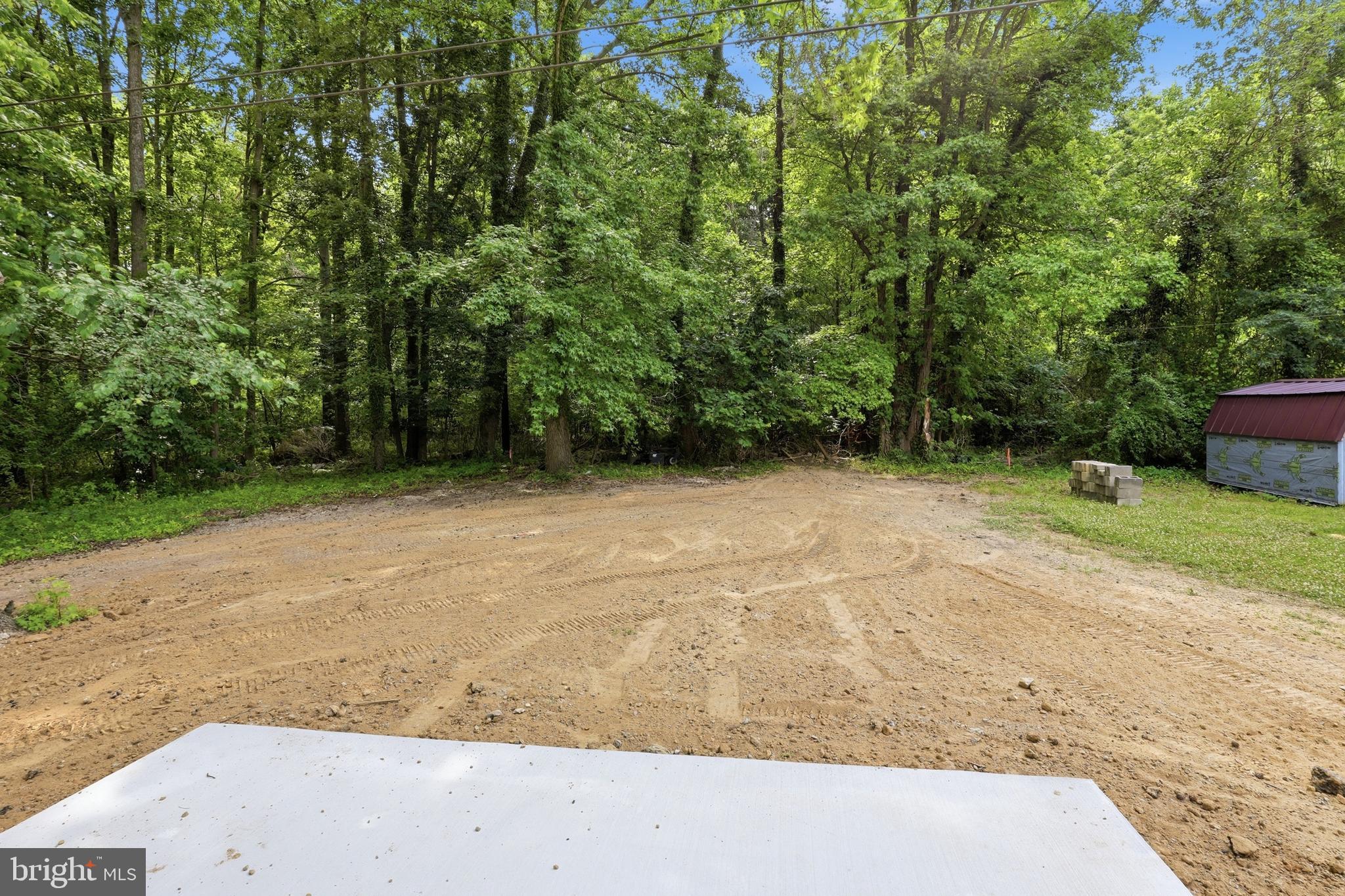 1354 College Road Dover, DE 19904 - Photo 42 of 46 a view of a backyard with green space
