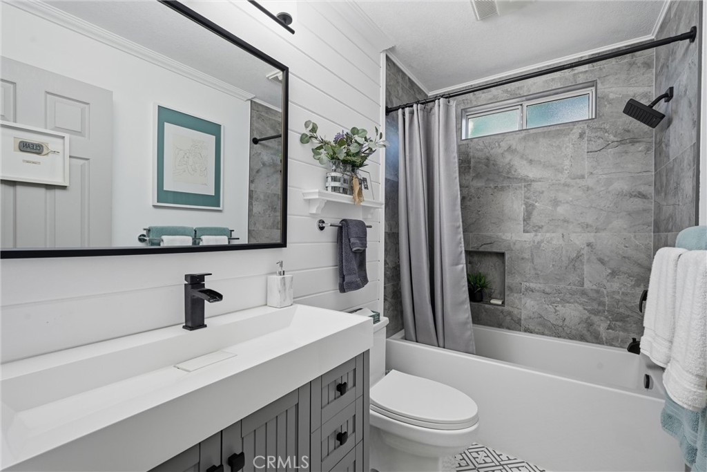 17432 Greenridge Road Hidden Valley Lake, CA 95467 - Photo 43 of 72 a bathroom with a sink a toilet and shower