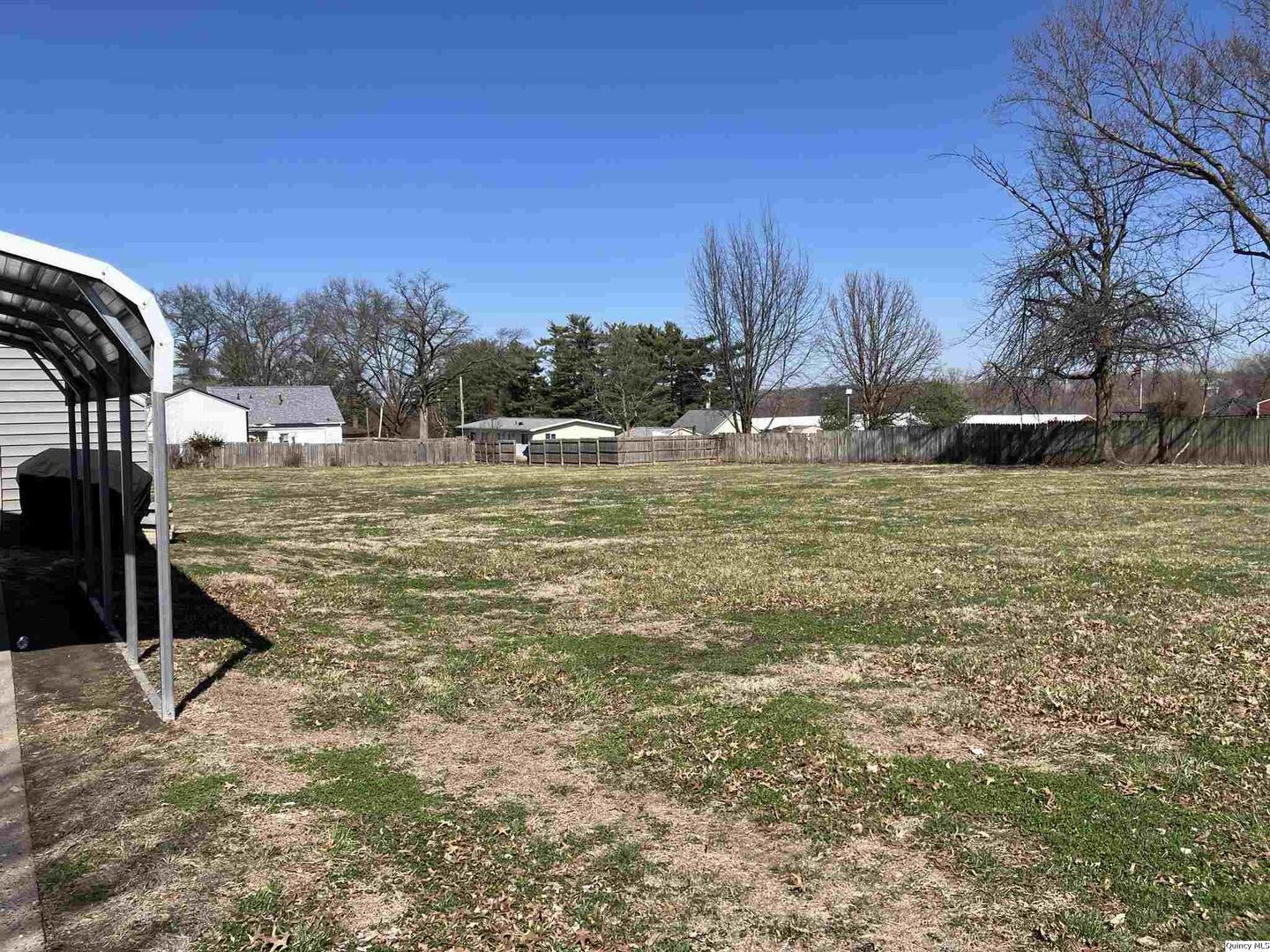 2415 Larch Road Quincy, IL 62301 - Photo 14 of 18 a view of a pool with a yard