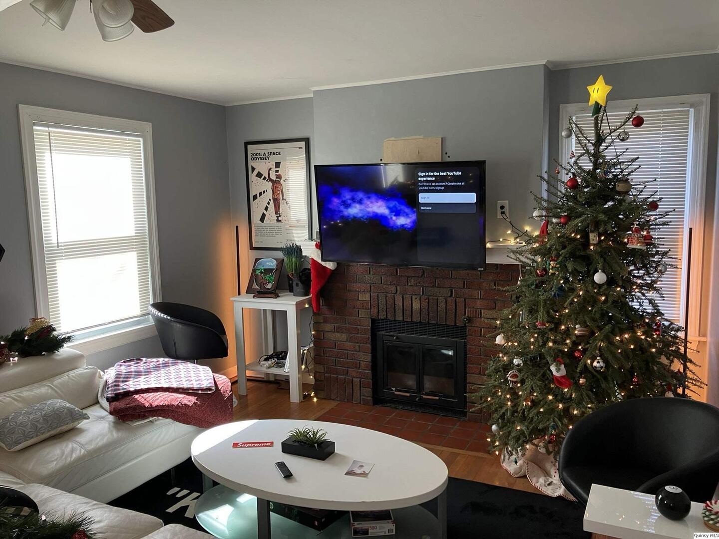 2415 Larch Road Quincy, IL 62301 - Photo 3 of 18 a living room with furniture and a fireplace