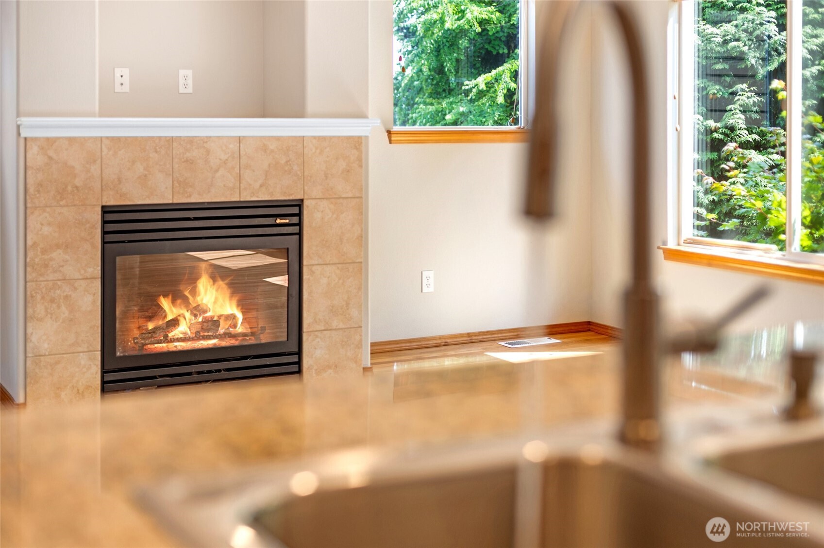 308 170th Place Southeast Bothell, WA 98012 - Photo 9 of 40 a view of a fireplace with a window