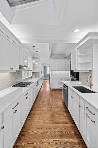 a large kitchen with cabinets