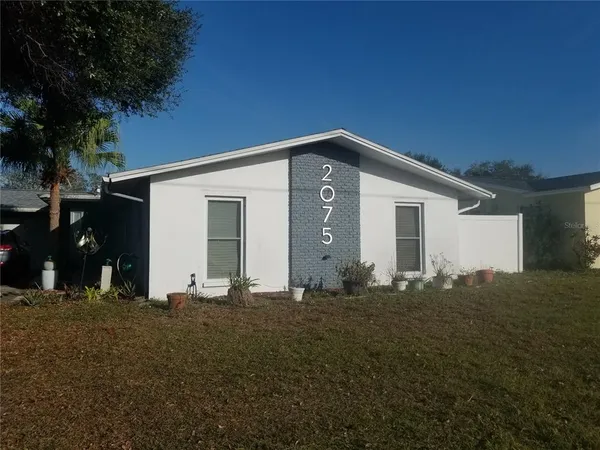 a front view of house with yard
