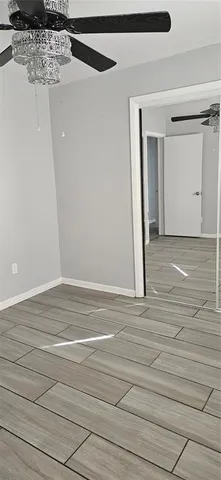 a view of a livingroom with wooden floor